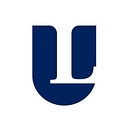 LASELL UNIVERSITY logo