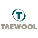 TAEWOOL AUSTIN logo